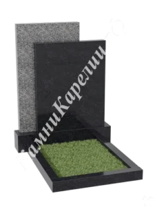 Прямая вертикальная стела из чёрного гранита, позади неё стела из серого гранита