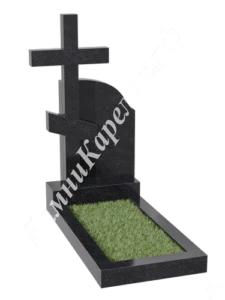 Фигурная стела из чёрного гранита с закруглённым верхом и крестом позади неё с короткой нижней перекладиной